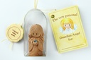 Angel porcelain with amber in cello - English/T700